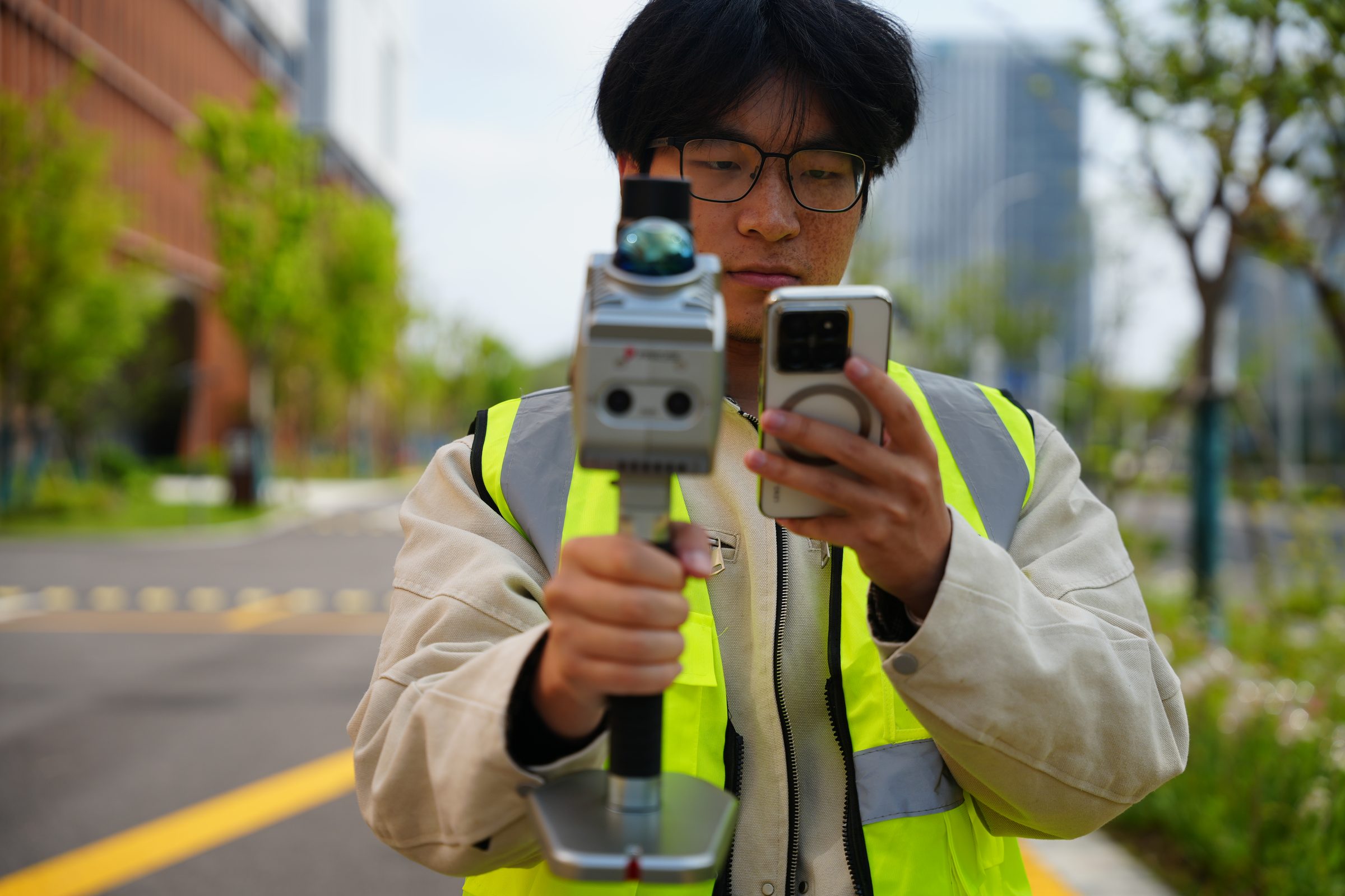 Operator reviewing a live S7 scan on a phone in the field